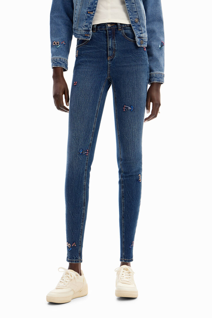 Jean slim perles fleurs | Desigual