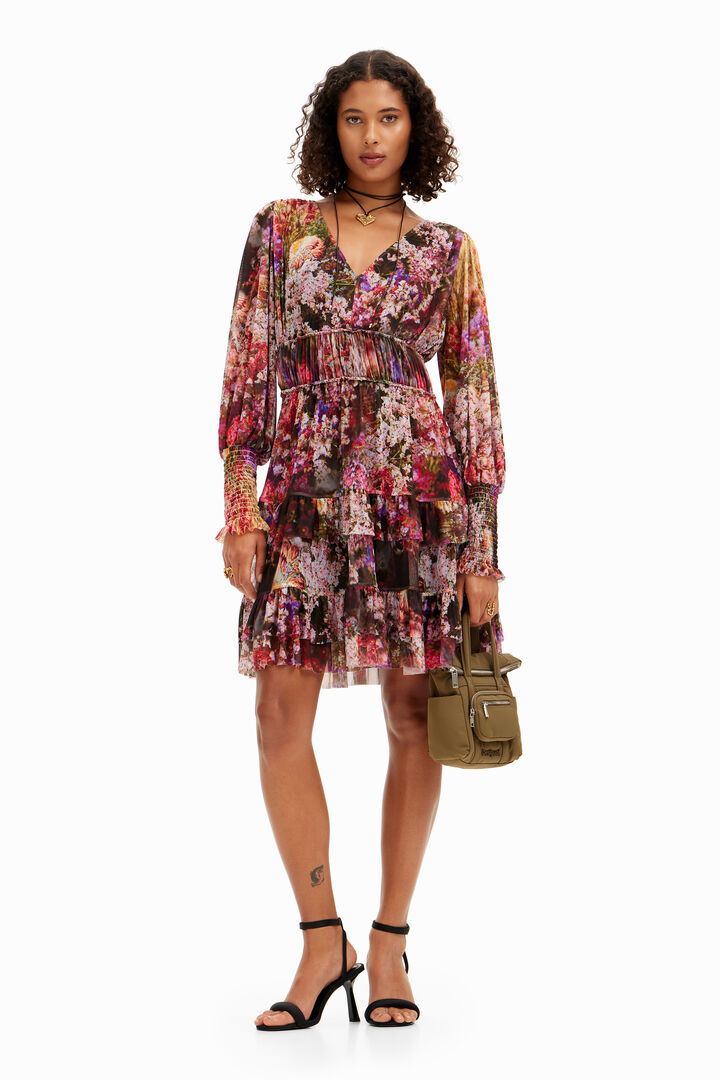Short dress with long puffed sleeves and floral print.