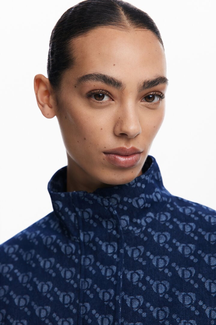 Geometric pattern poncho | Desigual