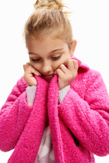 Double-breasted bouclé coat