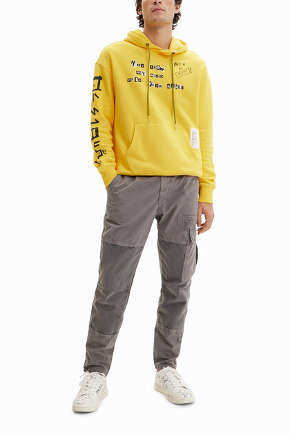 Sweatshirt met capuchon en teksten