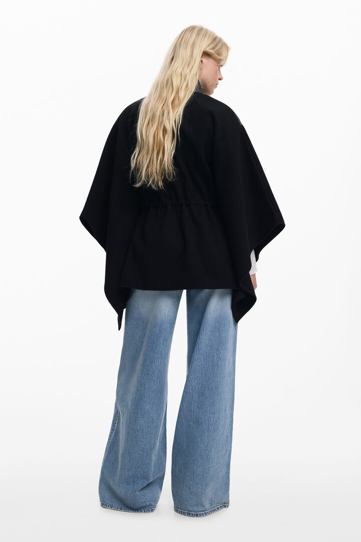 Combined faux leather poncho | Desigual