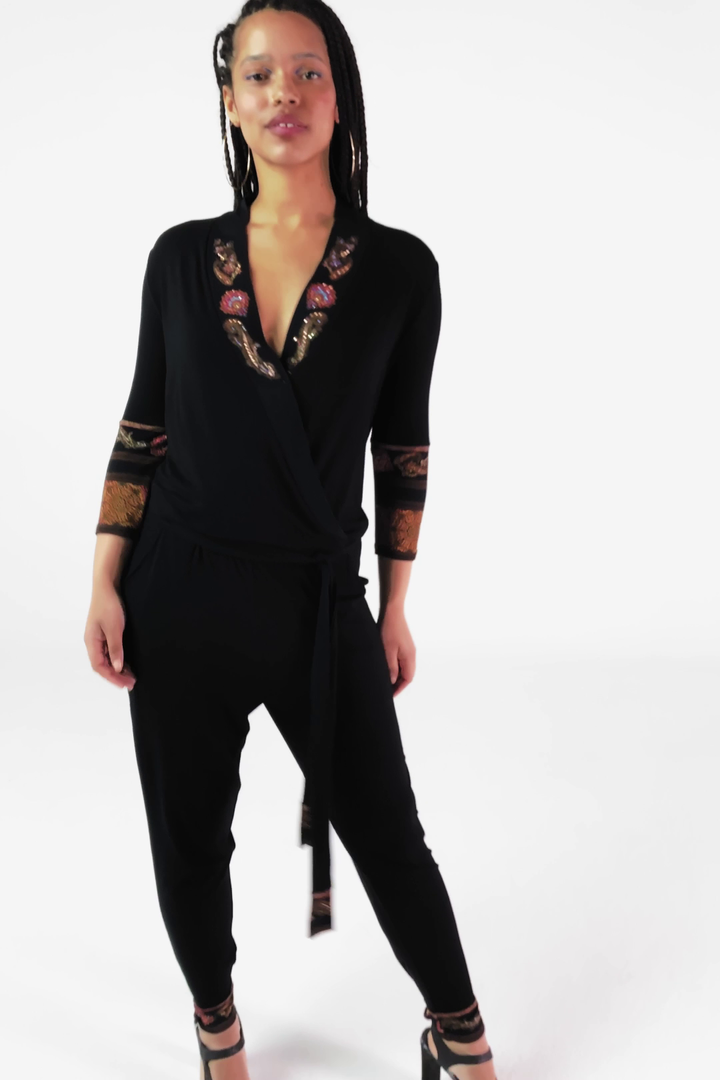 Black jumpsuit with ethnic frieze pattern details | Desigual