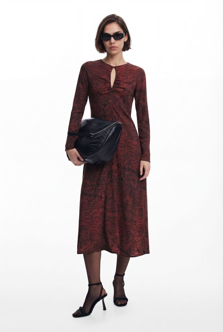 DRESS WITH DESIGUAL LINES
