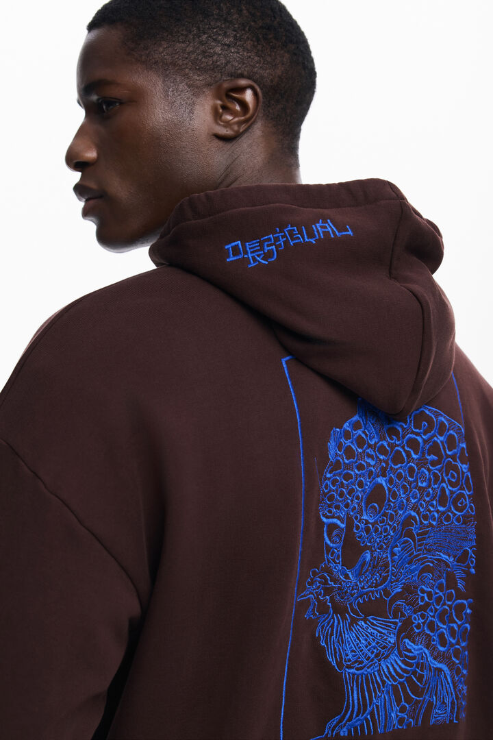ドラゴン柄のフード付きスウェット | Desigual