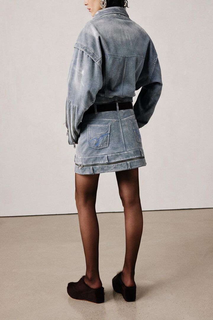 Denim-effect leather skirt studio