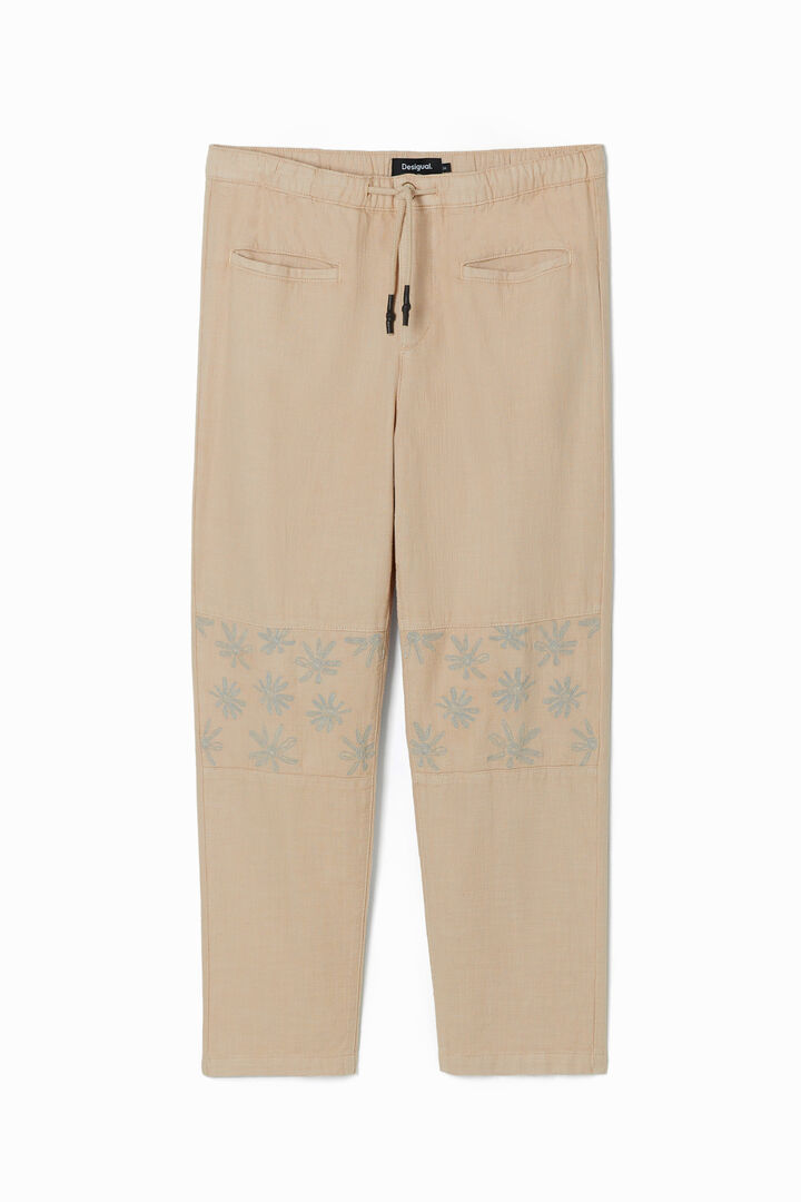 Trousers with floral details | Desigual