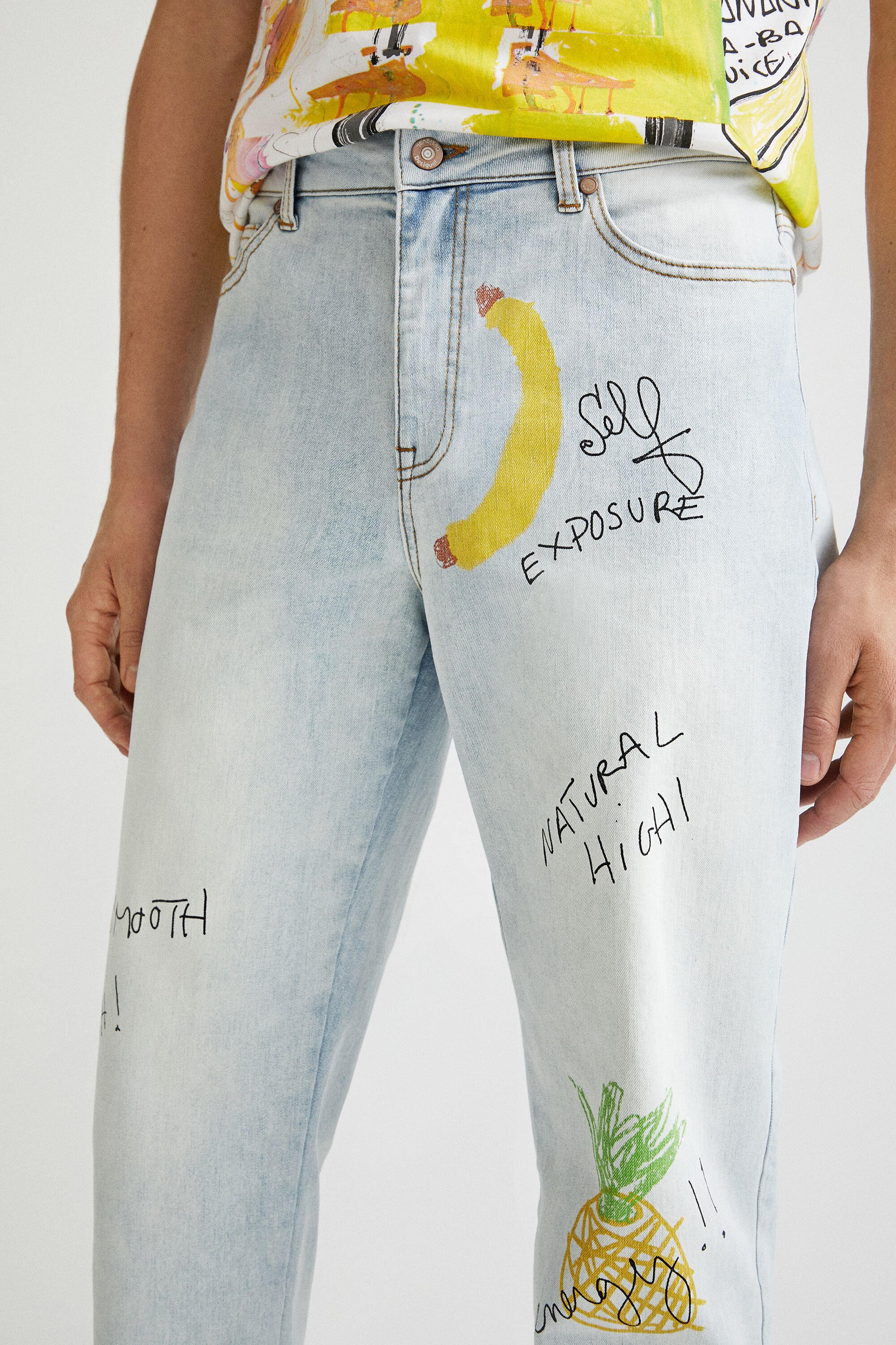Gucci graffiti jeans on sale
