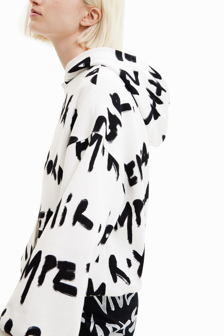 Dessuadora oversize text Manifesto all-over | Desigual