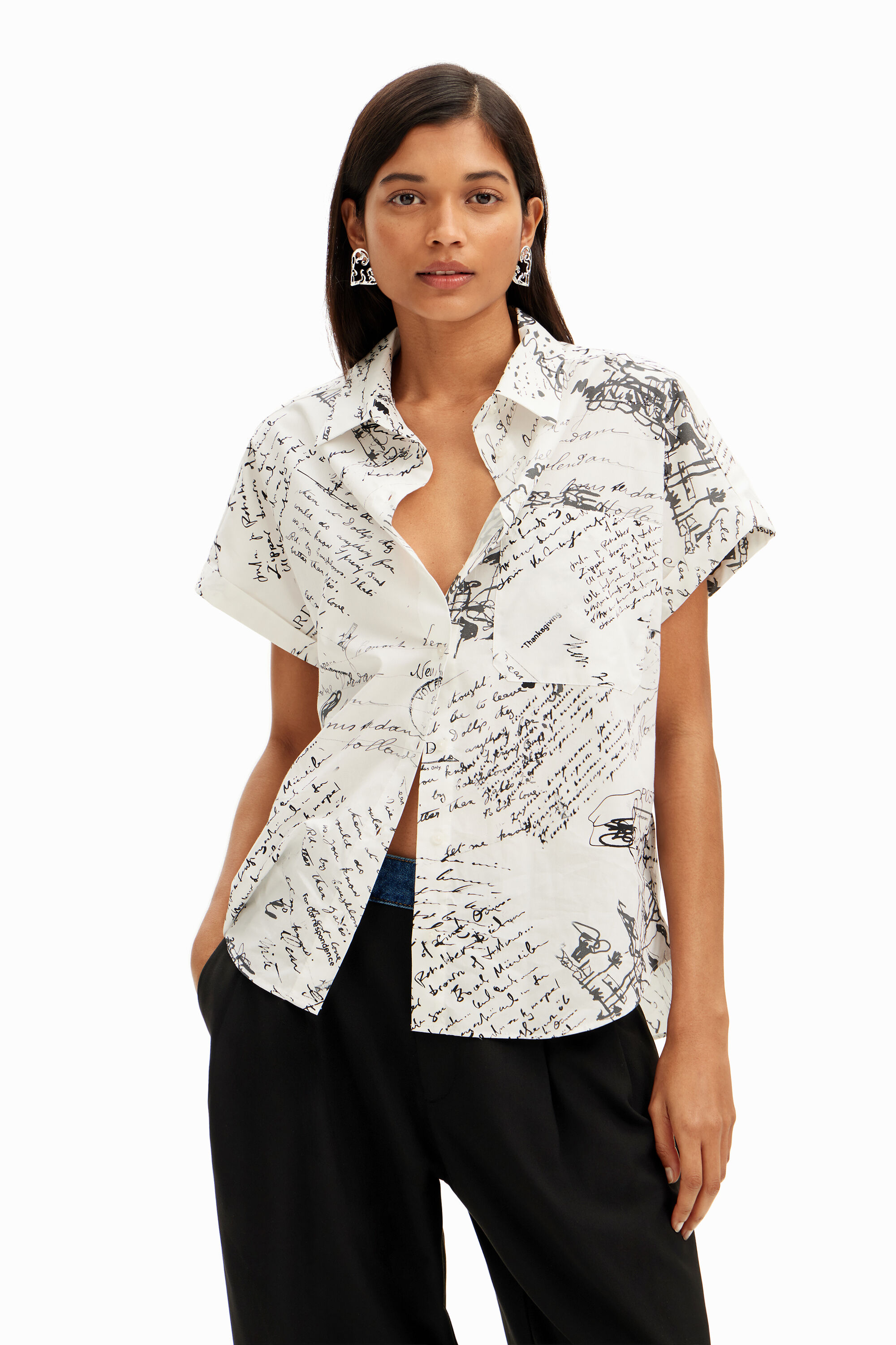 Short-sleeved shirt with texts.
