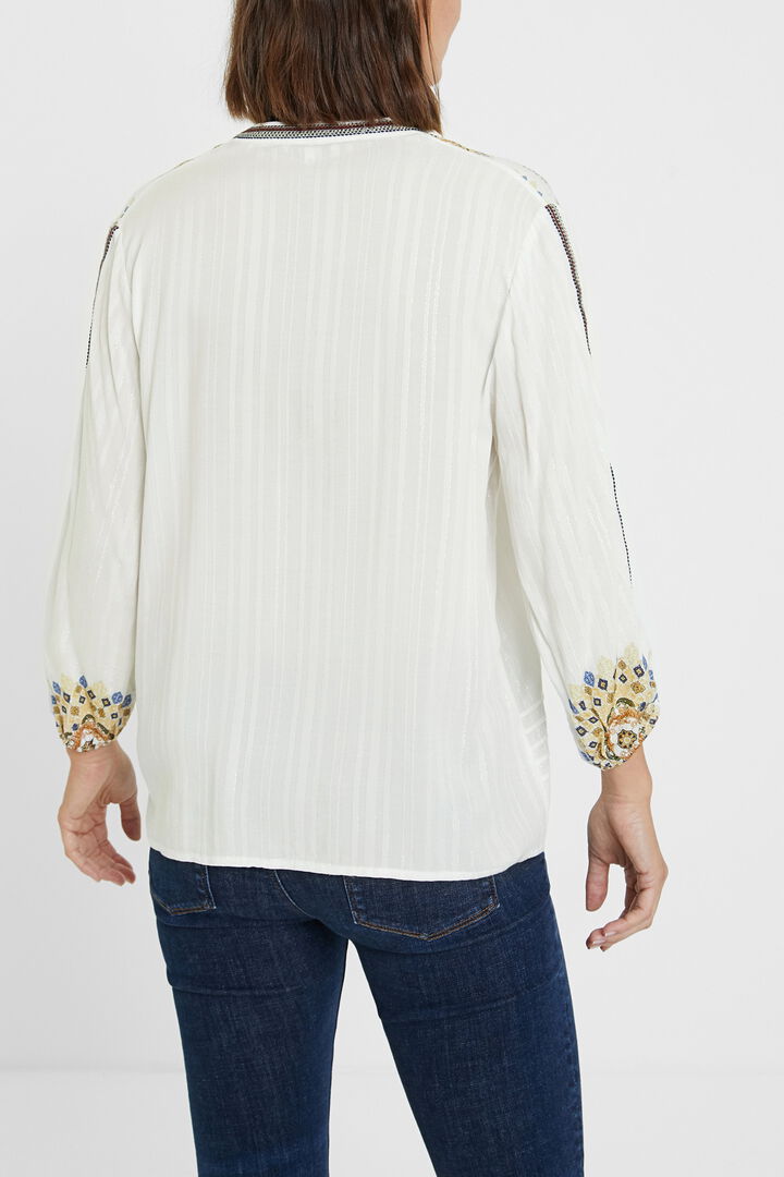 Blusa boho manga 3/4 y cuello pico | Desigual