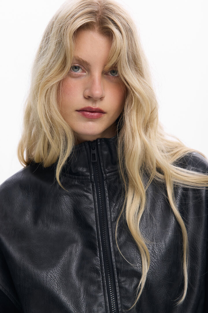 Combined faux leather poncho | Desigual