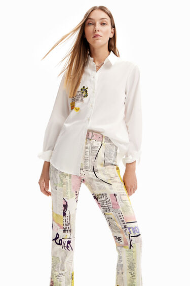 Newspaper flare trousers | Desigual