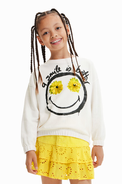 Sweatshirt met bloemen en Smiley®