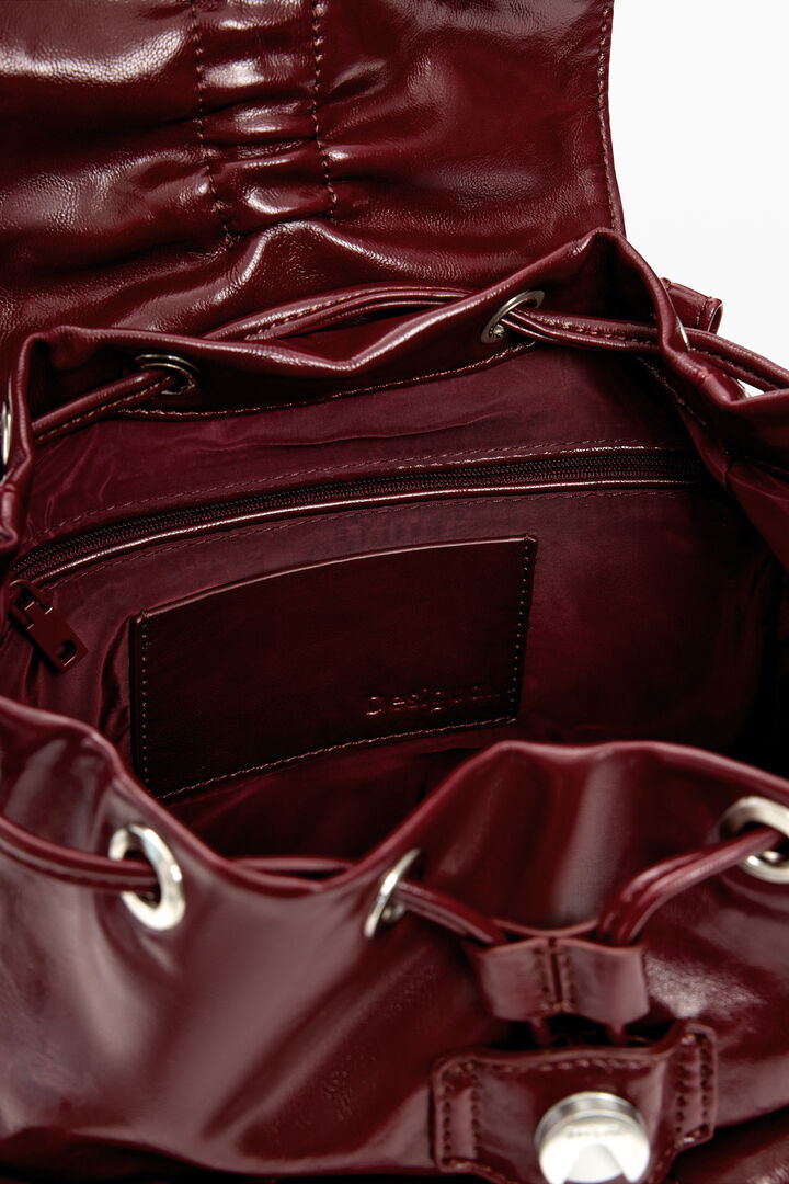 Small shiny backpack with bow | Desigual