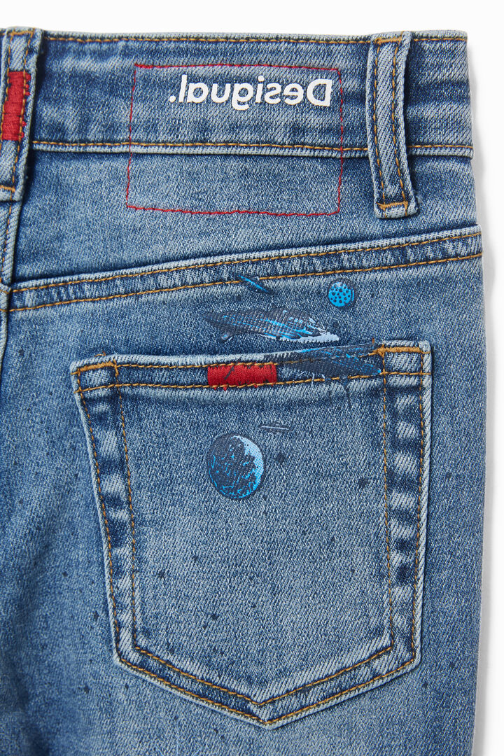 Pantalón vaquero dibujos espacio | Desigual