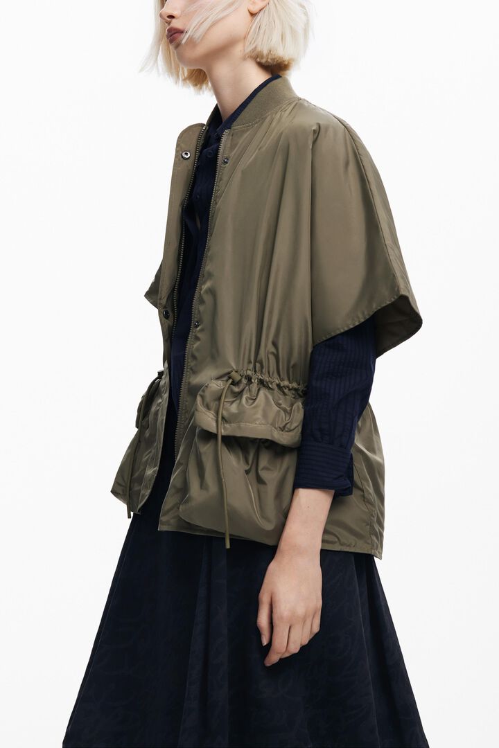 Adjustable nylon poncho