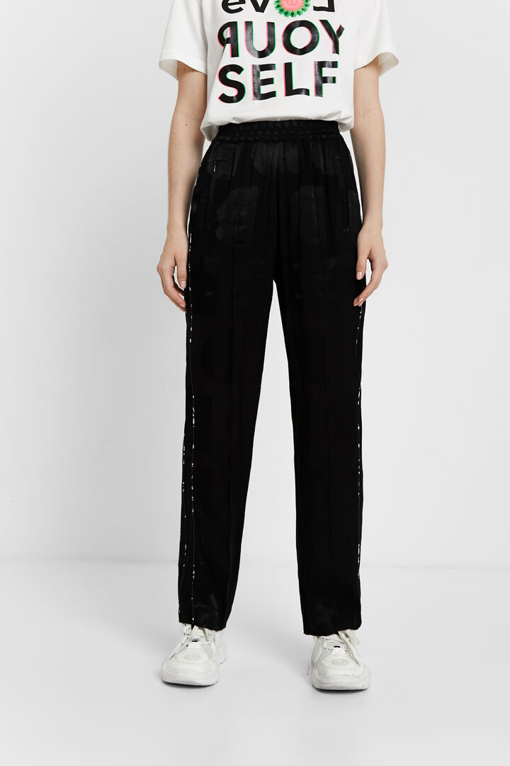 Trousers in glossy logomania | Desigual