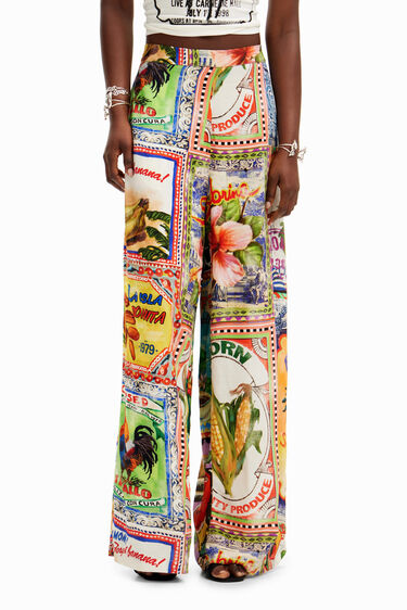 Spodnie wide leg z pocztówkami Stella Jean | Desigual