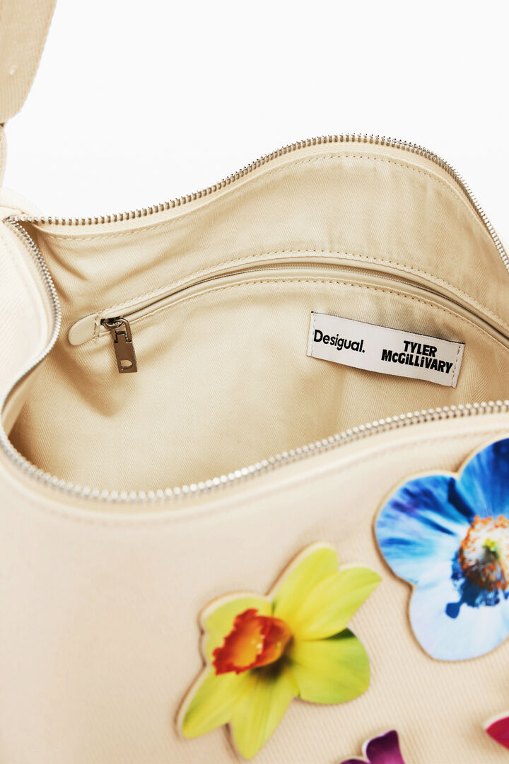Convertible pants with flowers Tyler McGillivary | Desigual