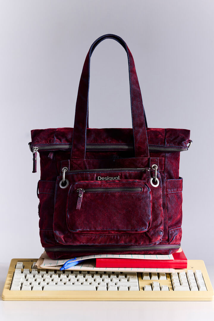 large multi-position backpack in velvet denim