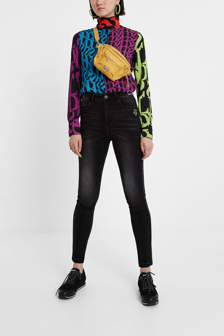 Skinny jeans with side strip and sequin details | Desigual