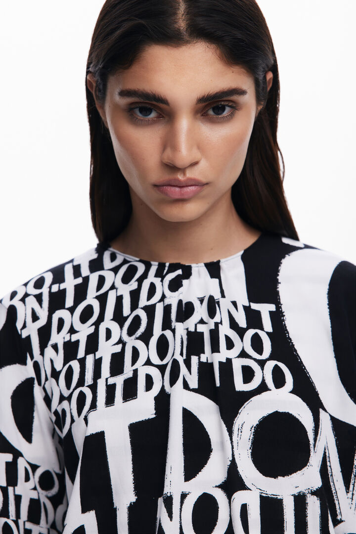 Blouse à lettres avec nœuds | Desigual