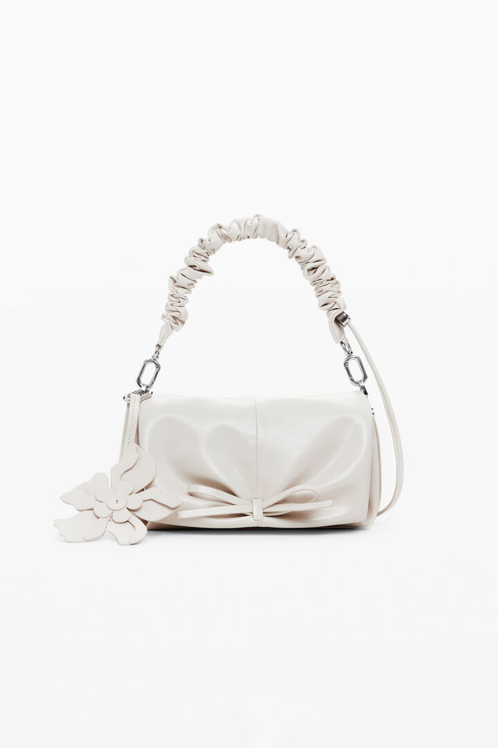 Shiny bow bag