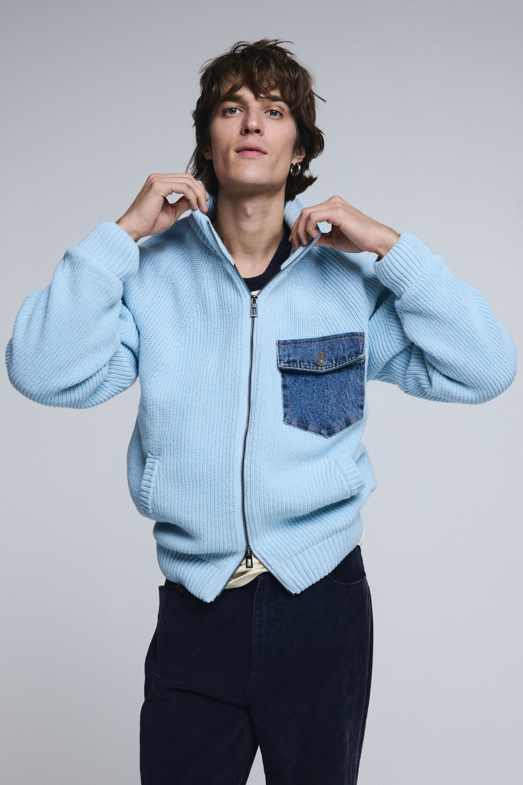 Gebreide trui met dubbele rits