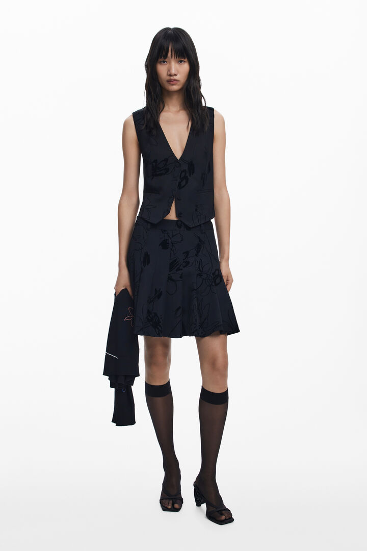 Flocked pleated mini skirt