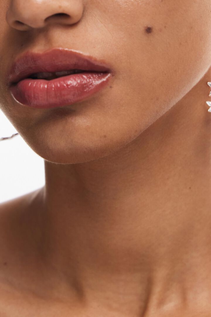 Zalio gold-plated spiral star earrings | Desigual