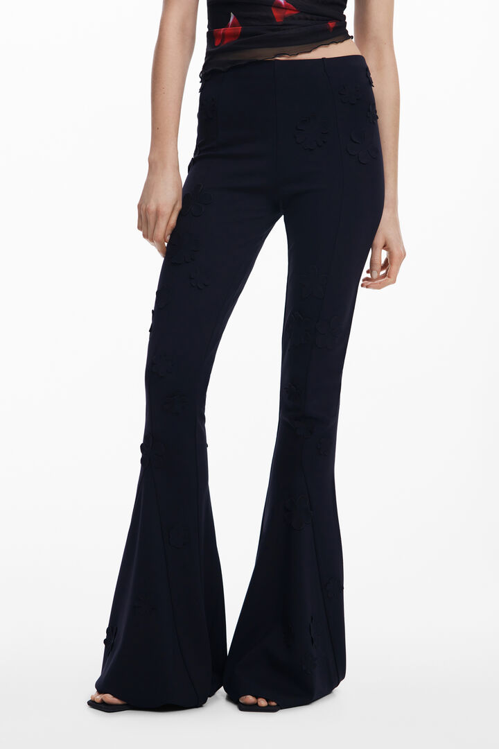 Tyler McGillivary floral bell-bottom pants | Desigual