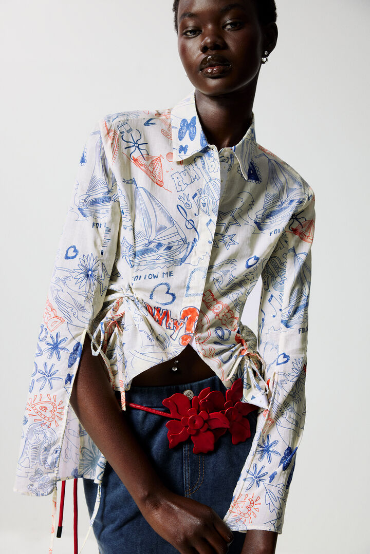 Cinturó flors efecte pell | Desigual