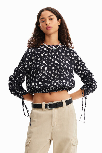 Short gathered floral blouse
