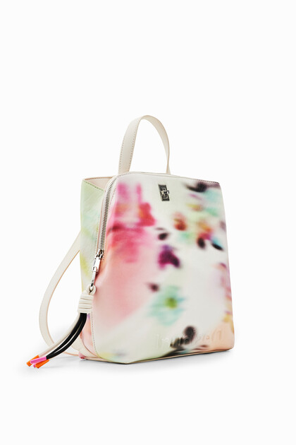Small out-of-focus backpack