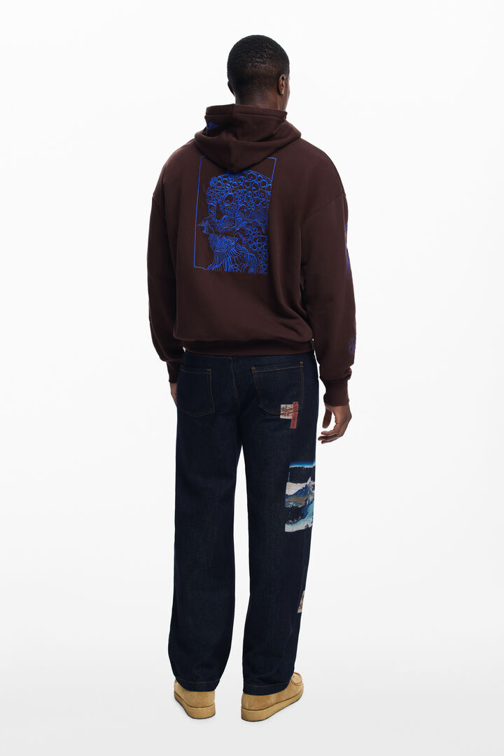 ドラゴン柄のフード付きスウェット | Desigual