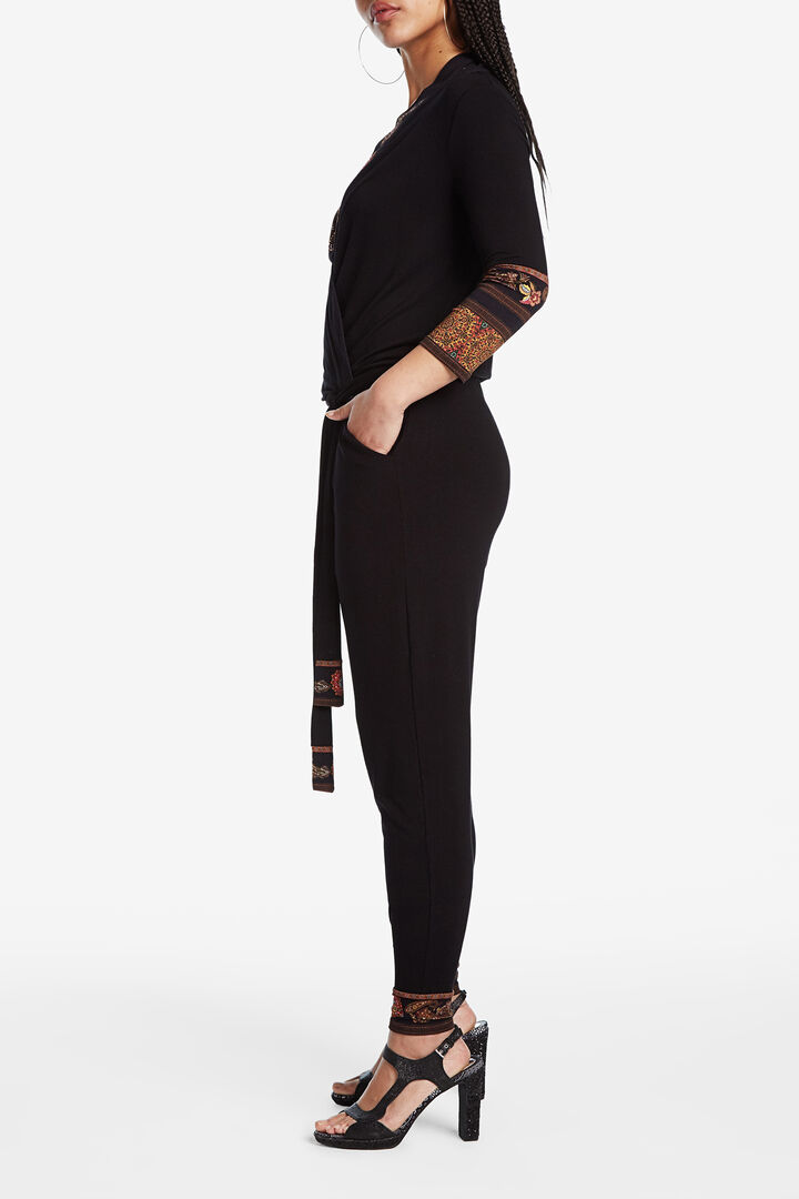 Black jumpsuit with ethnic frieze pattern details | Desigual