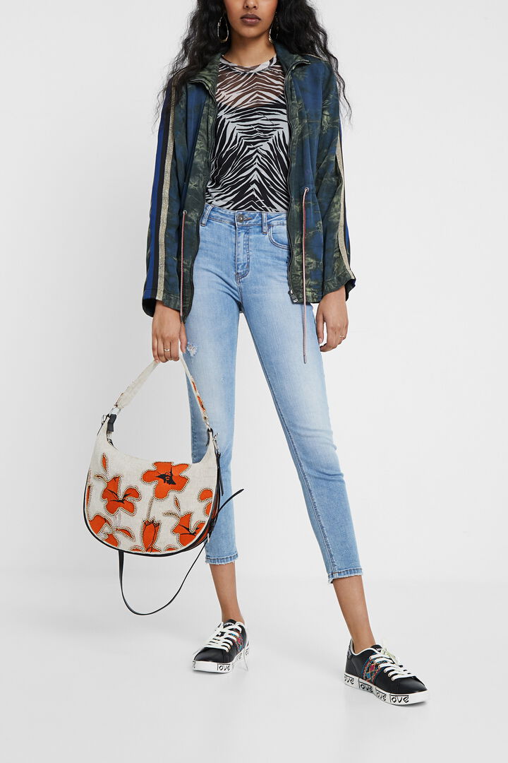 Bolso redondeado con hibiscos y perlas | Desigual