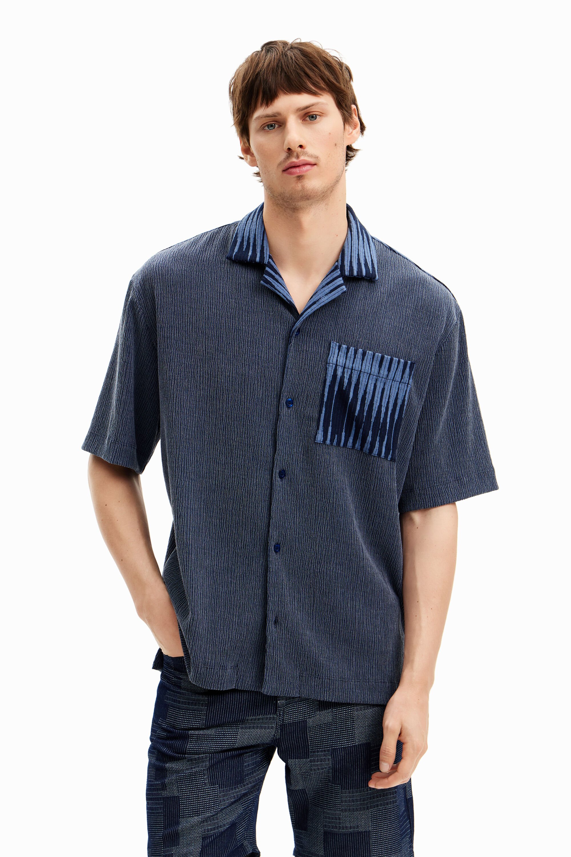 Polo desigual hombre clearance