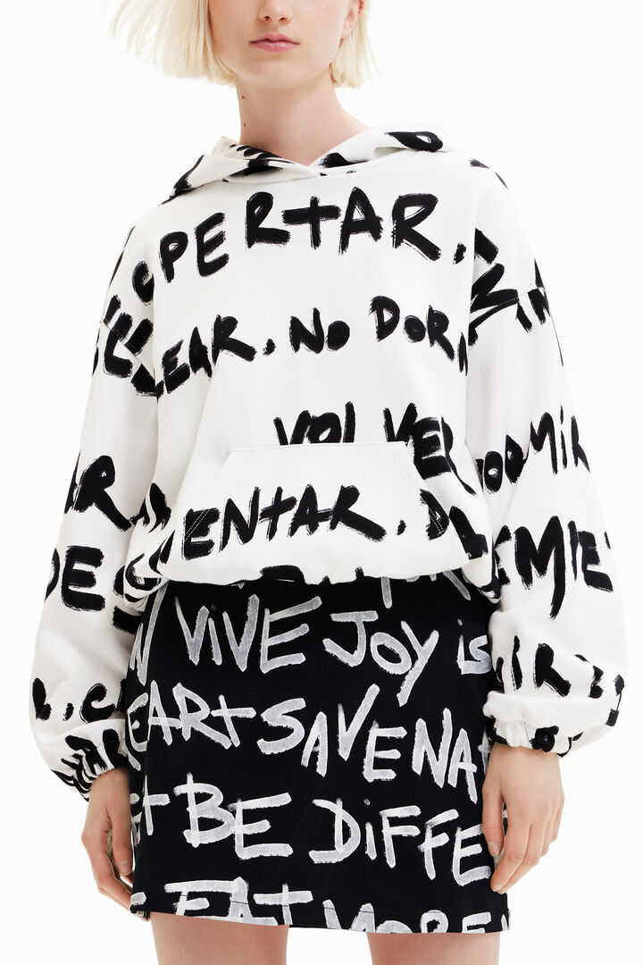 Dessuadora oversize text Manifesto all-over | Desigual