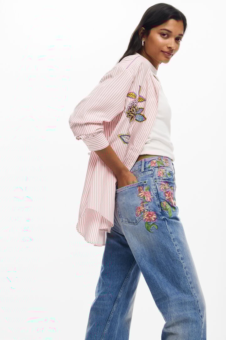 Long denim pants with flowers | Desigual