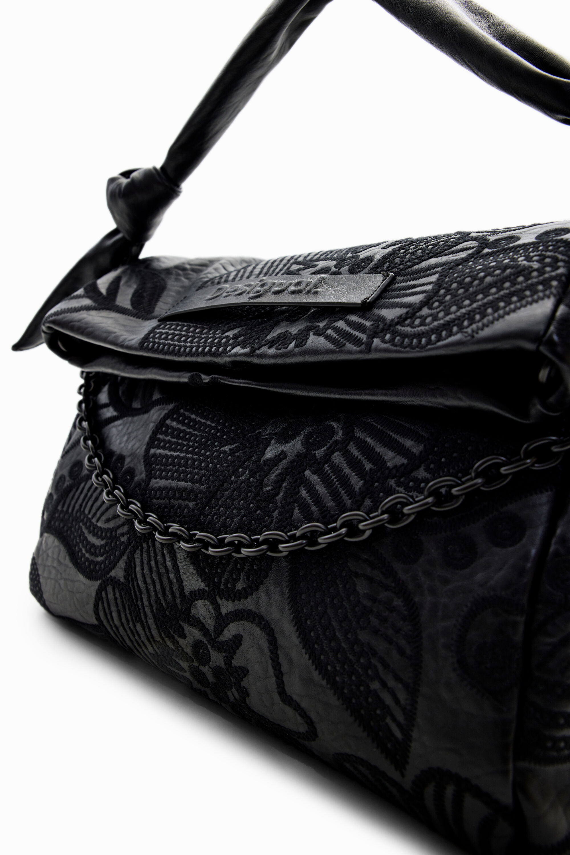 Bolso desigual sales flores