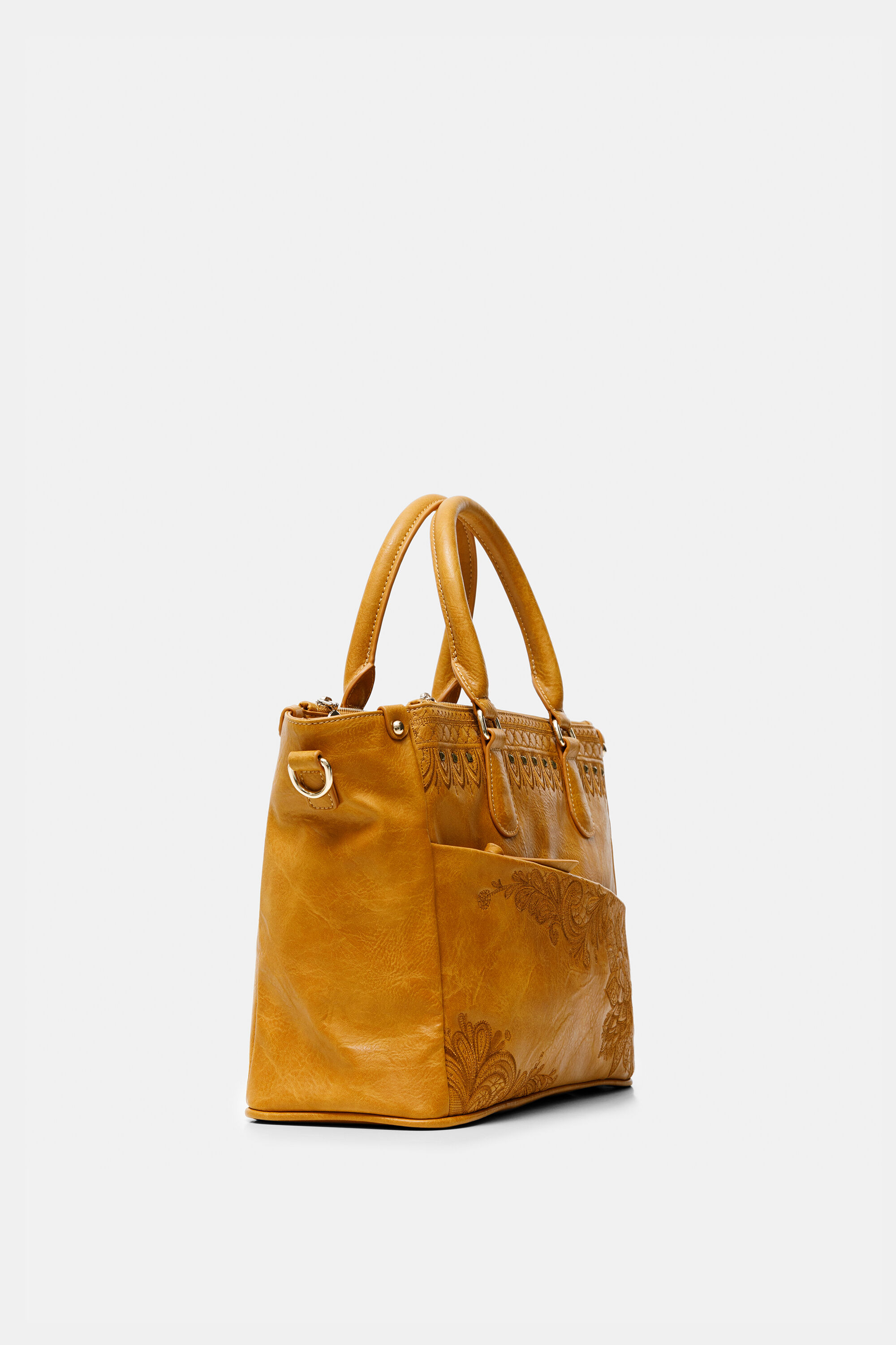 Bolso desigual 2025 tachuelas