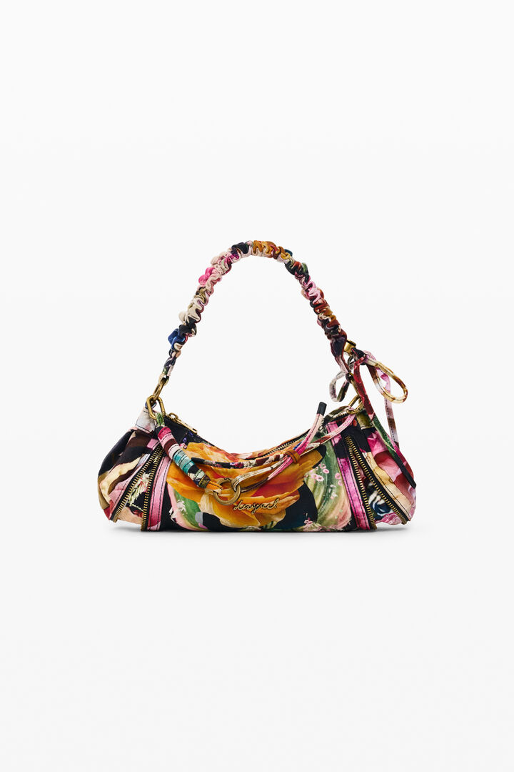 small printed M. C. Lacroix bag