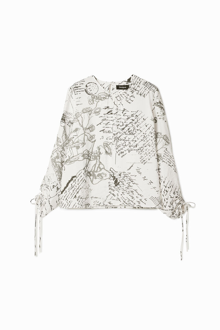 Blouse with adjustable sleeves and text prints.