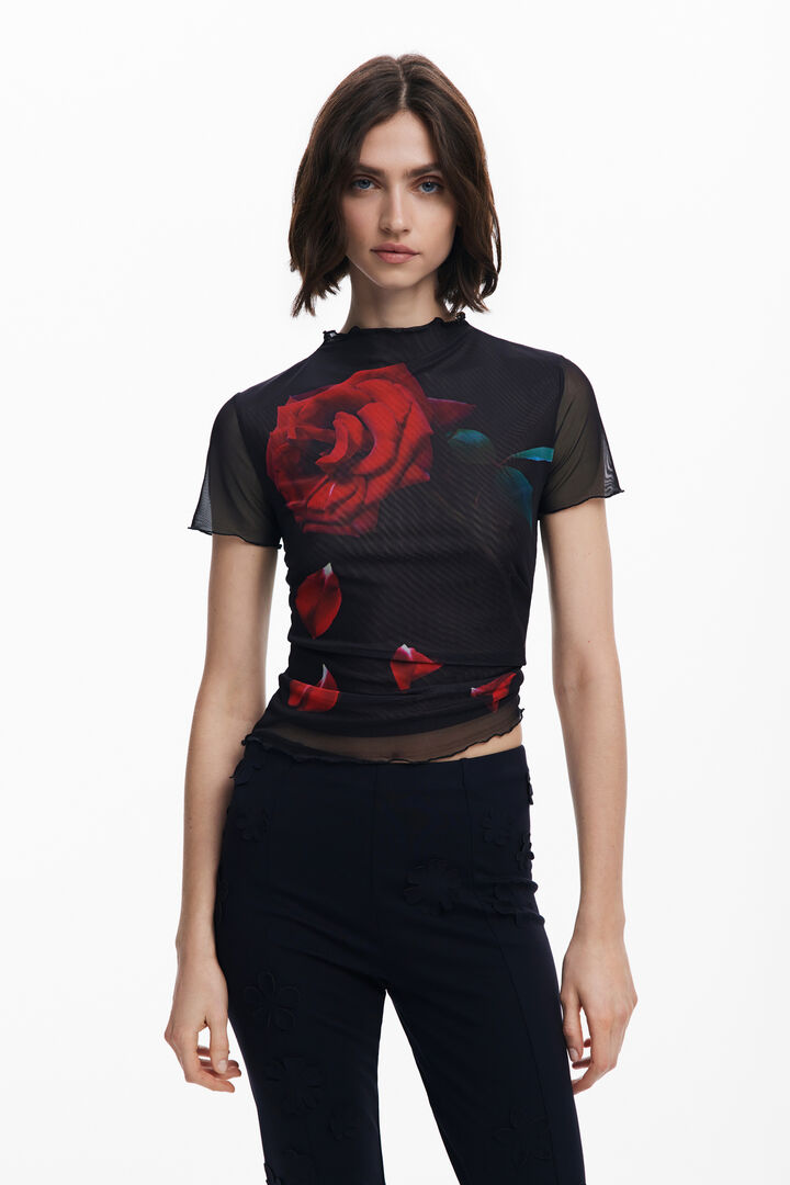 Tyler McGillivary floral bell-bottom pants | Desigual