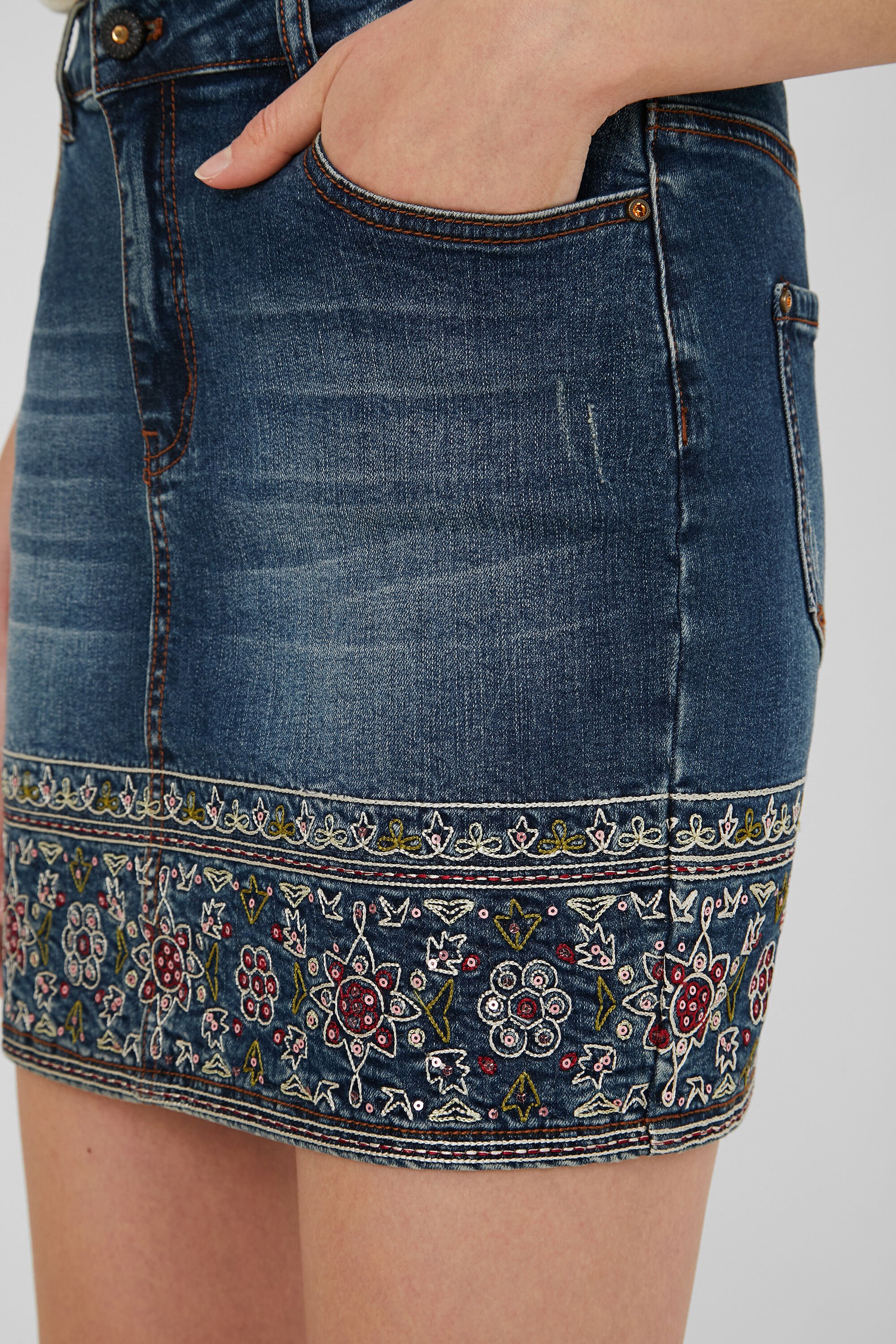 Embroidered denim mini skirt