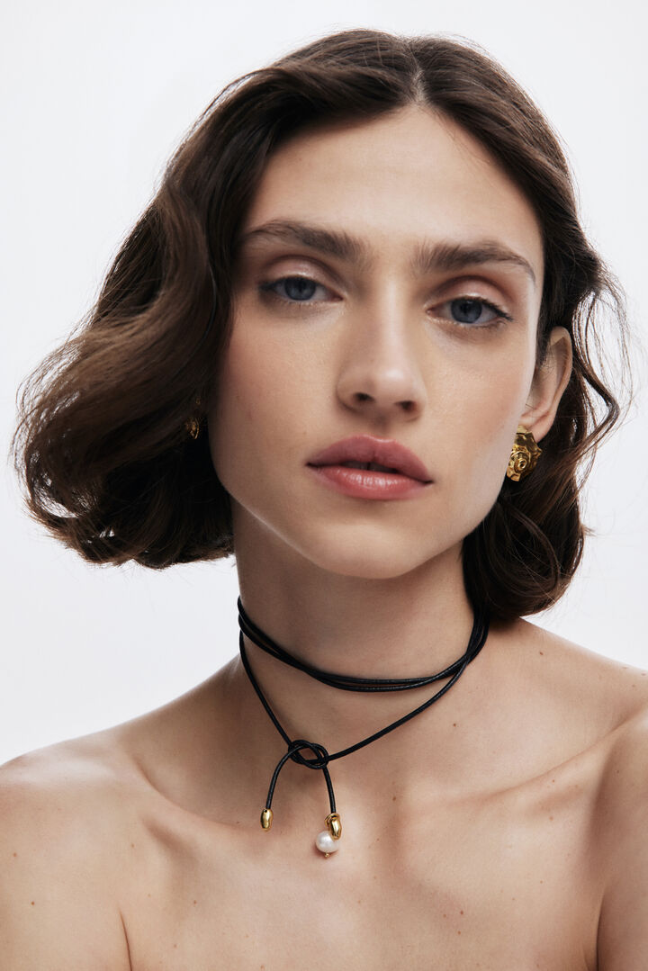 Gold-plated shell earrings Zalio | Desigual