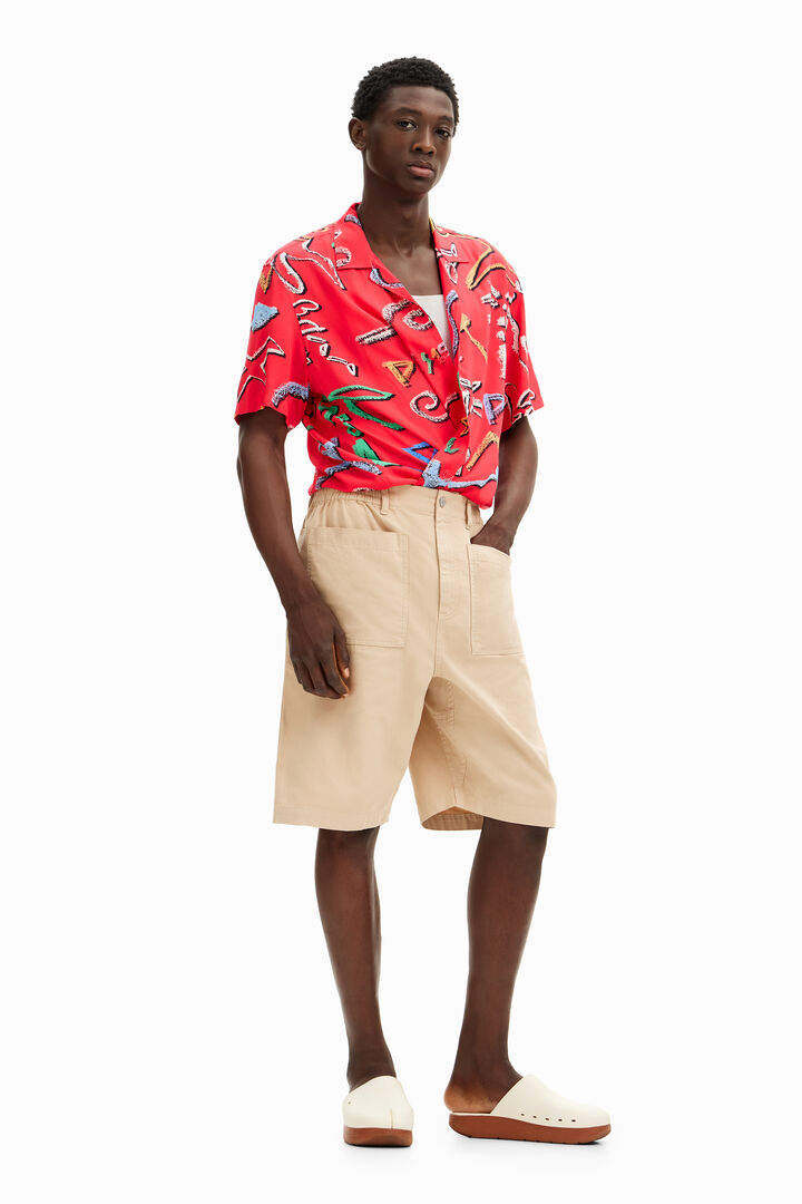 Shorts unis poches