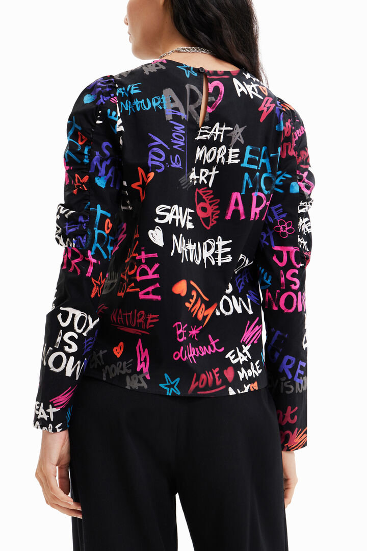 Blusa mangas abullonadas texto | Desigual